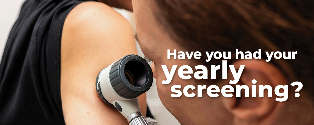 dermatologist performing a yearly screening